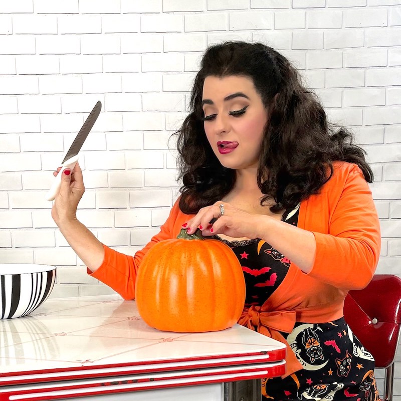 Vintage Halloween Pinup Girl Carving Pumpkin
