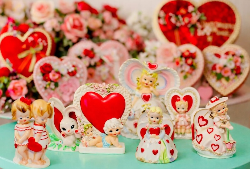 Vintage 1950s ceramic Valentine planter by Relpo featuring a girl with spaghetti trim hair holding a large red heart, Mid-Century modern kitsch decor.